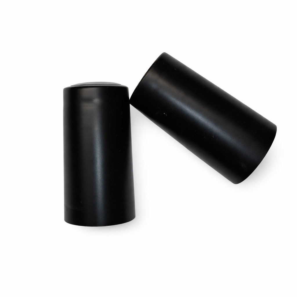 Universalūs termiškai susitraukiantys dangteliai. Juodos spalvos su nuplėšimo juostele
